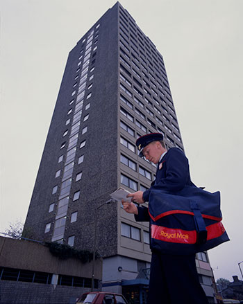 Postman and tower block